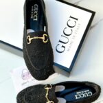 حفاية Gucci مع ستراس، مختومة.