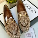 حفاية Gucci مع ستراس، مختومة.