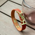 اسوارة ysl جلد عسلي 🤎