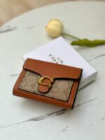 ⁦جزدان coach عسلي صغير 🤎⁩ - الصورة ⁦2⁩