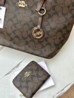 ⁦كوتش بني بكج(حقيبة+جزدان نقود)⁩ - الصورة ⁦3⁩