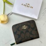 جزدان coach بني واسود معرق 🤎 صغير