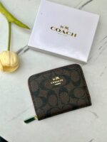 جزدان coach بني واسود معرق 🤎 صغير