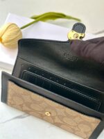 ⁦جزدان coach اسود كبير 🖤⁩ - الصورة ⁦3⁩