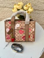 حقيبة توت باج من كوتش 💋🤎 قاعدة 25سم