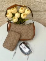 ⁦حقيبة كوتش مع محفظة 🍒🤎 قاعدة 22سم⁩ - الصورة ⁦4⁩