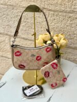 ⁦حقيبة كوتش مع محفظة 💋🤎 قاعدة 22سم⁩ - الصورة ⁦3⁩