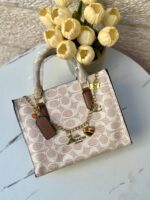 ⁦حقيبة Coach Rogue مع مداليا السلسلة وحزام اضافي طويل قاعدة 25سم⁩ - الصورة ⁦3⁩