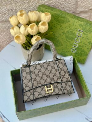 حقيبة التعاون بين gucci & balenciaga قاعدة