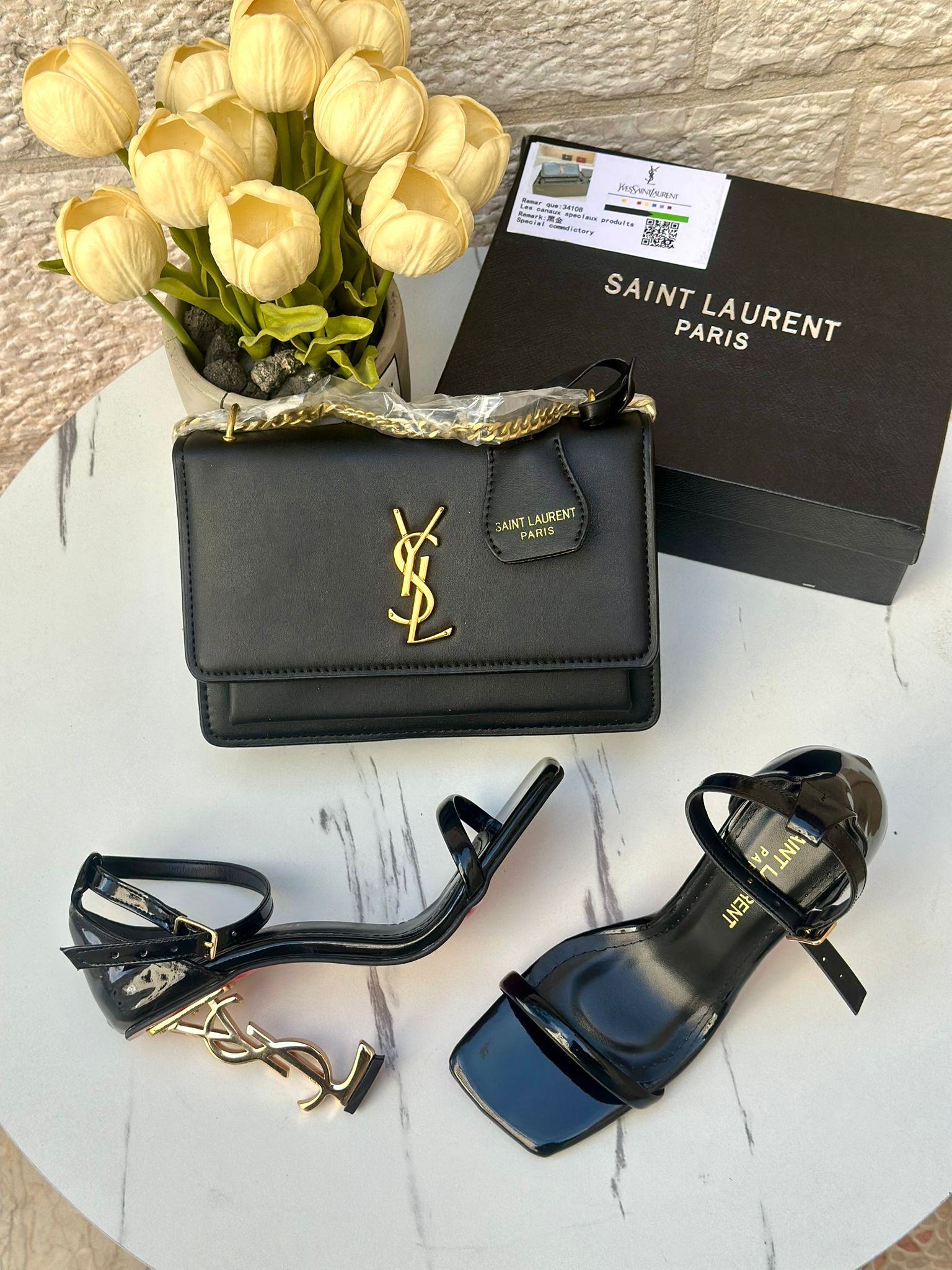 a096618b-c1b7-4ccf-9940-e08ac6ea02b7 بكج YSL اسود مع هيلز مفتوح - الصورة 1