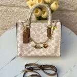 حقيبة Coach Rogue مع مداليا السلسلة وحزام اضافي طويل قاعدة 25سم