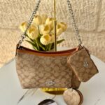 حفيبة كوتش كروسبودي مع جزدان + مرآة + حزام طويل