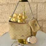 حفيبة كوتش كروسبودي مع جزدان + مرآة + حزام طويل