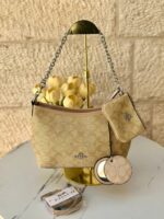 حفيبة كوتش كروسبودي مع جزدان + مرآة + حزام طويل