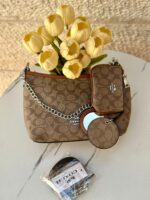 ⁦حفيبة كوتش كروسبودي مع جزدان + مرآة + حزام طويل⁩ - الصورة ⁦3⁩